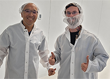 Two men in lab coats.